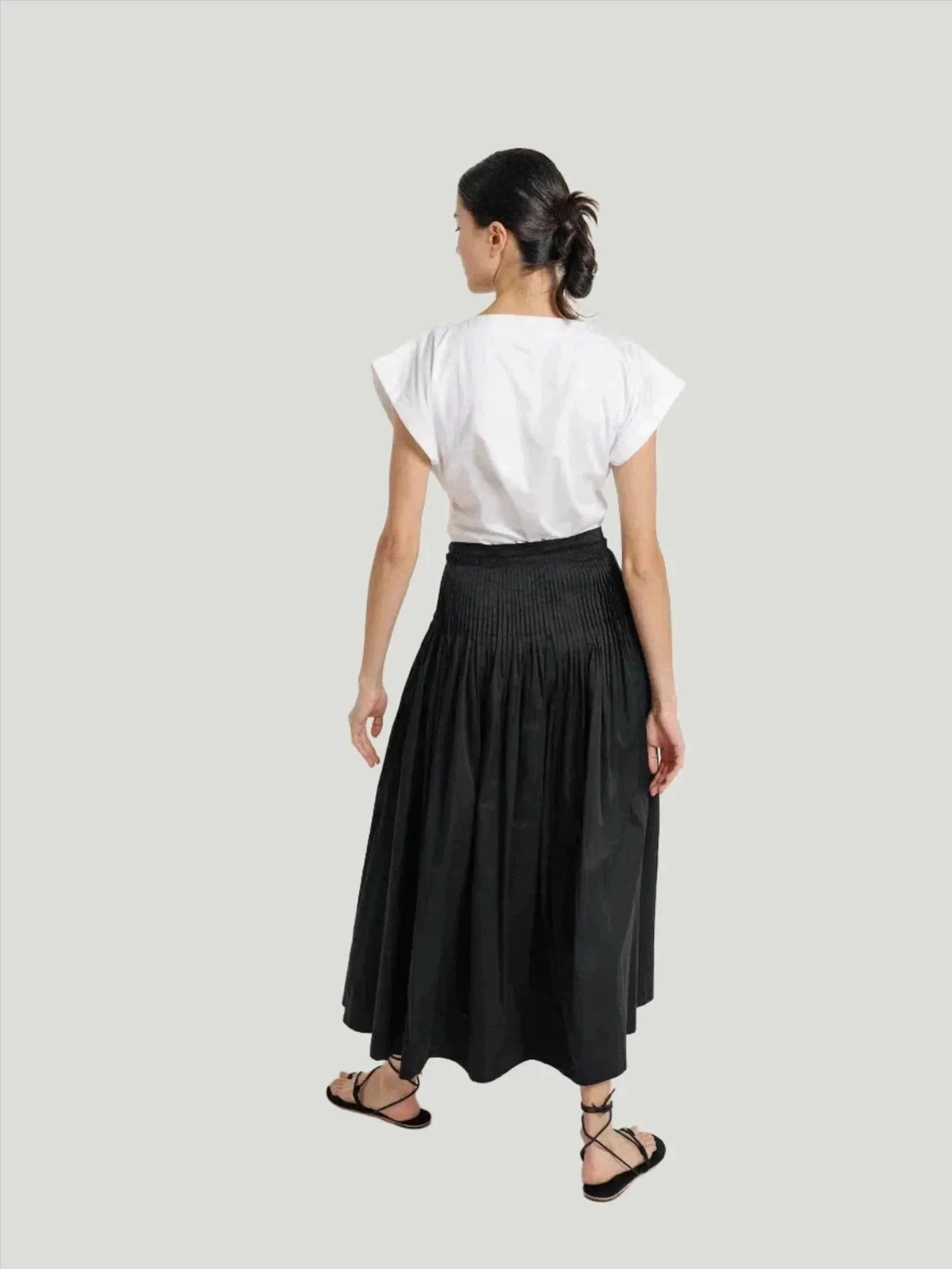 LAUDE the Label Drop Waist Pleated Skirt